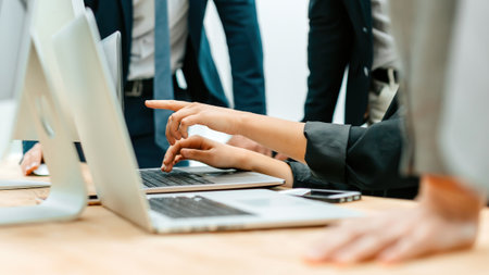 close up. the working group uses laptops to verify the dataの写真素材