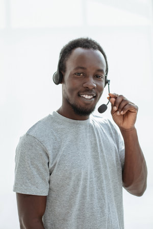 close up. a handsome young man with a headset.の写真素材