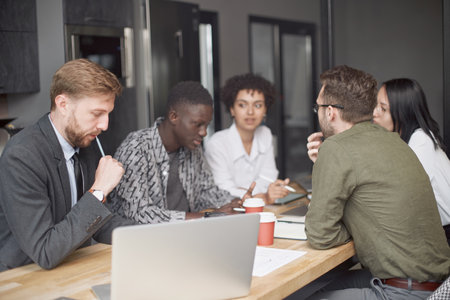 multinational business team discussing ideas for a joint startupの写真素材