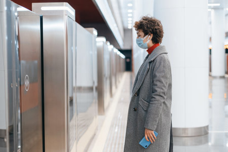 business woman waiting for a subway train.の写真素材