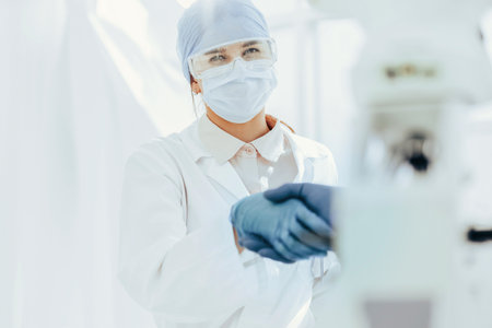 close up. Microbiology scientists shaking hands. science and health.の写真素材