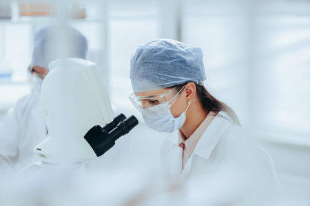 female scientist conducts research in a medical laboratory.の写真素材