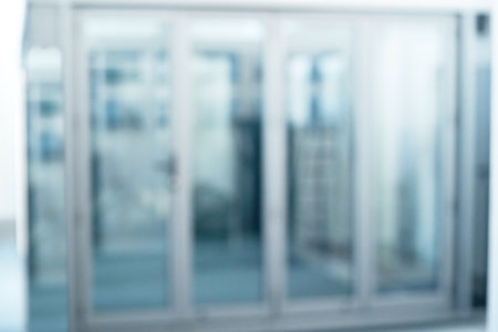 blurry image of glass sliding doors in a private home .の写真素材