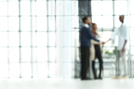 blurry image of business people shaking hands. copy of the text space for your business.の写真素材