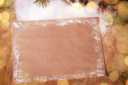 blank sheet for congratulations on Christmas background. beautiful bokeh effect from a garland.の写真素材