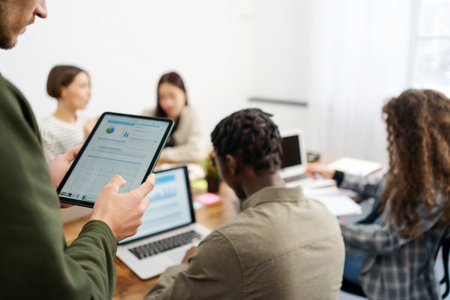 business person uses a tablet to check financial data. Graph researchの写真素材