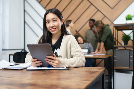 portrait of a young business woman with a digital tablet.の写真素材