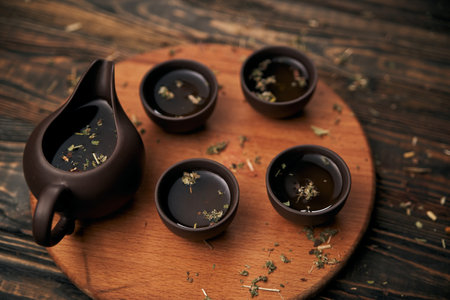 tea set and tea leaves on wooden background.の写真素材