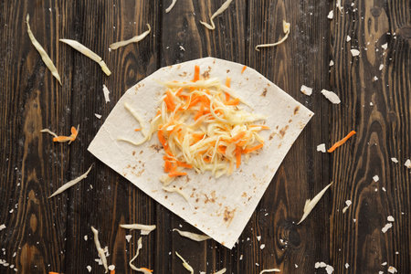 cabbage salad on pita bread.preparation of Shawarma. photo with copy spaceの写真素材