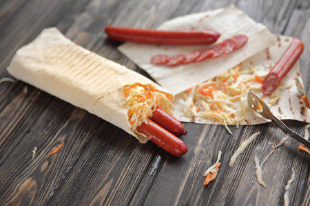 lavash with spicy sausage and vegetables.photo with copy spaceの写真素材