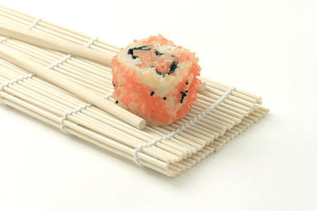 large sushi and chopsticks .isolated on a lightの写真素材