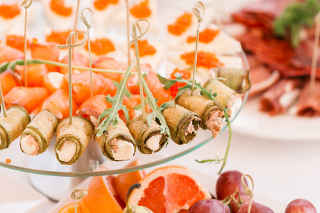 cold fish snacks on the festive tableの写真素材