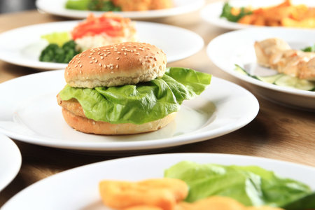 host of delicious dishes on the table in childrens restaurantの写真素材
