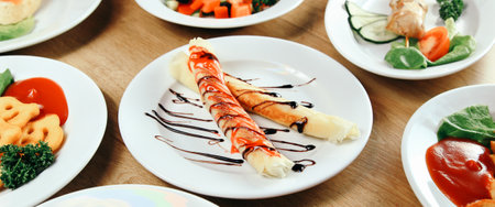 delicious dishes on the table in restaurantの写真素材