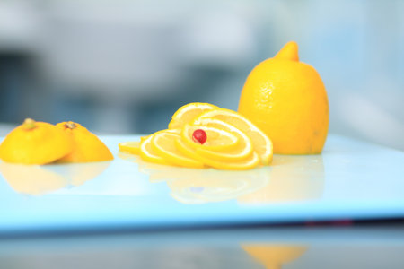 close up.ripe lemon on the cutting Boardの写真素材