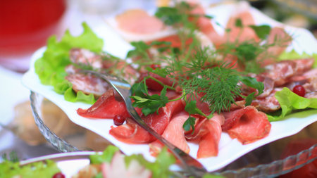 cold snacks on the table in the restaurantの写真素材