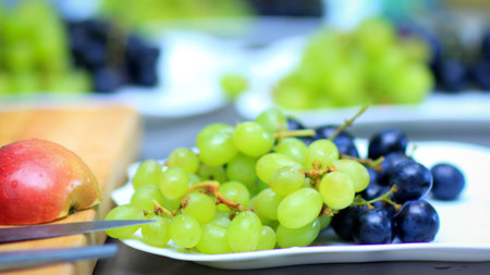 variety of fruits on the table in the restaurantの写真素材