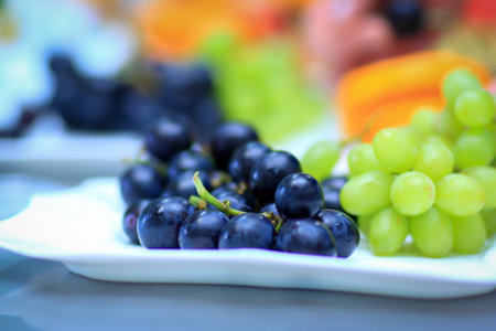 variety of fruits on the table in the restaurantの写真素材