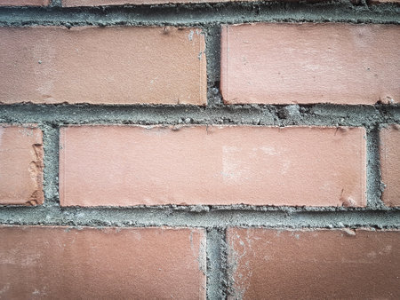 fragment of red brickwork. background and textureの写真素材