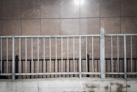 close up. metal railing near the wall.の写真素材