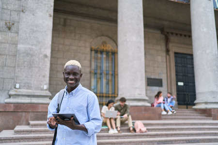 student looking at the screen with a digital tablet.