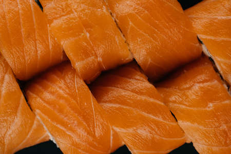 Group of Fresh Salmon rolls cut top viewの写真素材