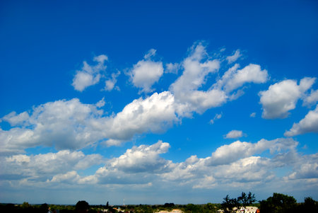 White clouds are photographed on a blue backgroundの写真素材