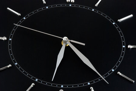 The black clock-face is photographed close-upの写真素材