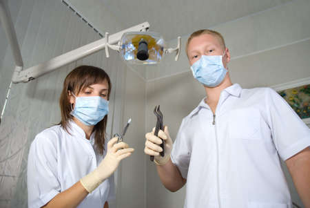 Dentists with tools in dental clinicの写真素材