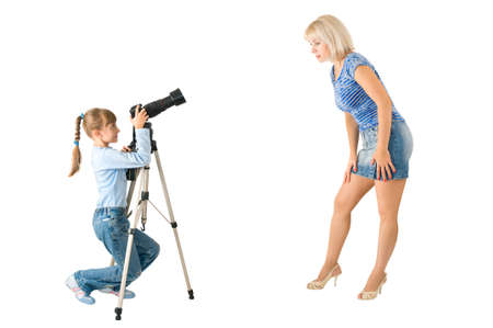 The girl - photographer photographes the beautiful womanの写真素材