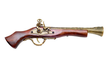 The ancient pistol is photographed close-upの写真素材