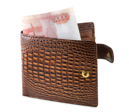 The brown purse is photographed on the close-up