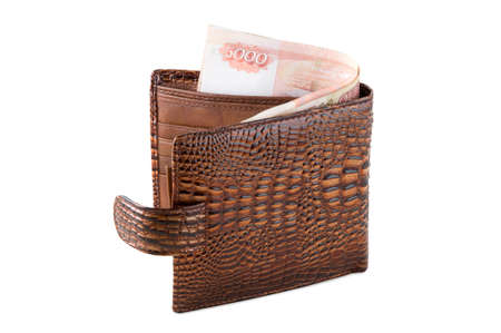 The brown purse is photographed on the close-upの写真素材