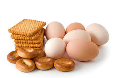 Eggs and pastry are photographed on the white background