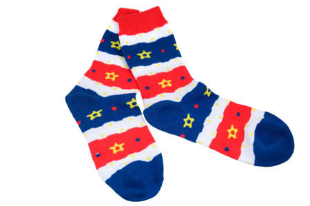 Striped socks are photographed on the white backgroundの写真素材