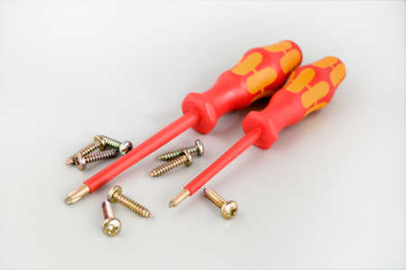 Screwdrivers and screws are photographed close-upの写真素材