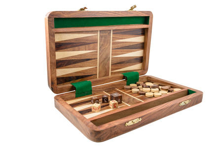 The backgammon is photographed on the white background