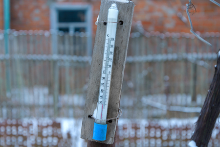 Old alcohol thermometer shows the temperature of -49 degrees Celsiusの写真素材