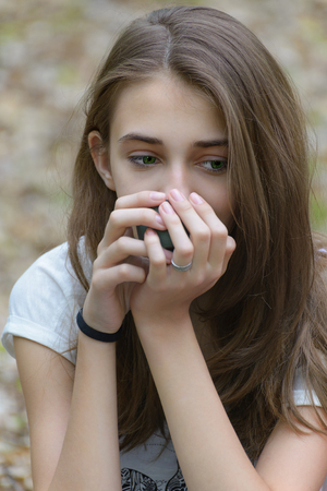 Portrait of a young girl with long hairの写真素材
