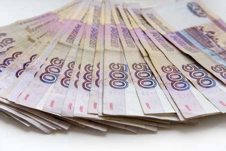 A heaps of banknotes in denominations of 500 rubles