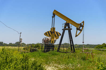 The jack pump stands in the field. North Caucasus.の写真素材