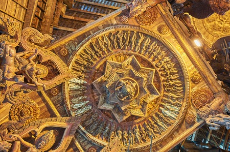 Pattaya, Thailand-February 23, 2014: Sanctuary of Truth is a temple construction in Pattaya, Thailand. The sanctuary is an all-wood building filled with sculptures based on traditional Buddhist and Hindu motifs. Pattaya, Thailand - February 23, 2014のeditorial素材