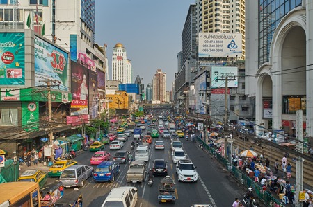 Bangkok, Thailand - February 26, 2014: Traffic moves slowly along a busy road on May 2, 2014 in Bangkok, Thailand. Annually an estimated 150,000 new cars join the already heavily congested streets of Bangkok. Bangkok, Thailand - February 26, 2014のeditorial素材