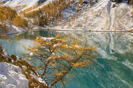 Snow covered winter mountain lake, Russia, Siberia, Altai mountains, Chuya ridge.