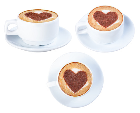 A cup of cappuccino, latte, drawing a heart shape, closeup, isolate on a white background.の写真素材