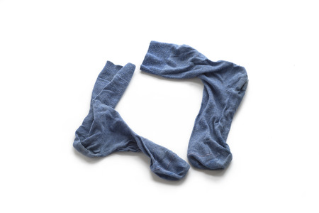Clean laundered men's socks on a white backgroundの写真素材