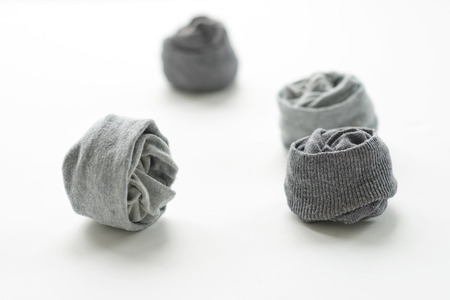 Clean laundered men's socks on a white backgroundの写真素材