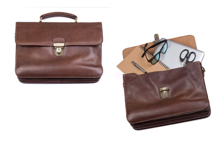 Business briefcase businessman. Brown. Laptop, notebook, glasses, scissors, pen.の写真素材