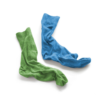 Clean laundered men's socks on a white backgroundの写真素材