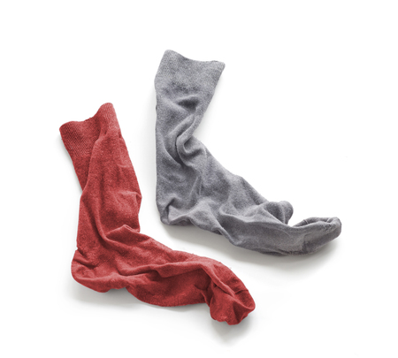 Clean laundered men's socks on a white backgroundの写真素材